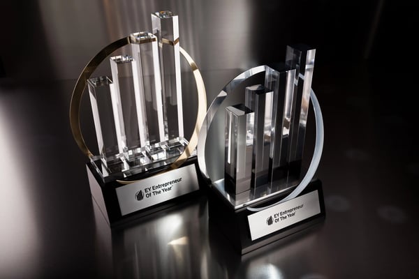 two trophies on a table