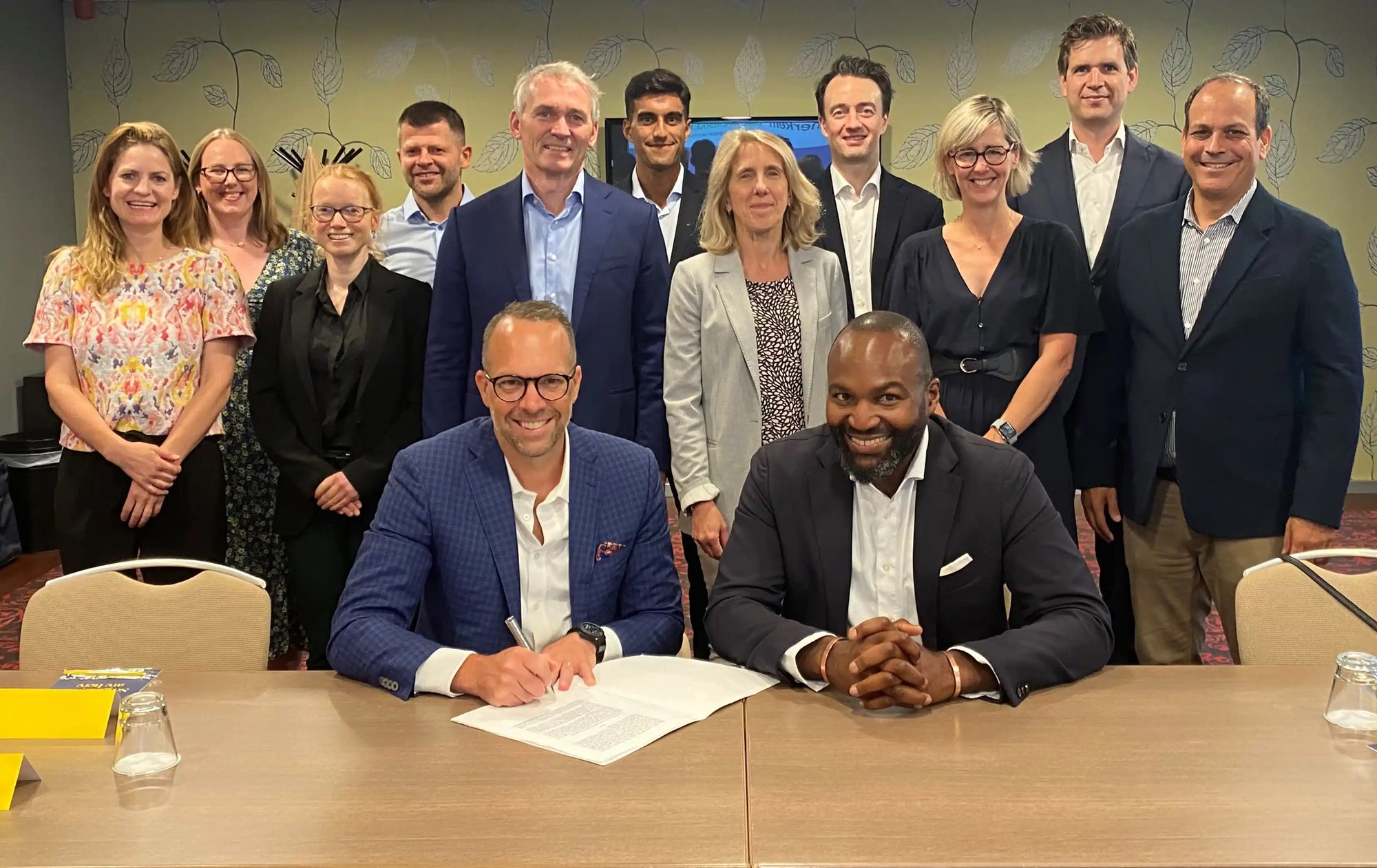 Group of people at an important signing