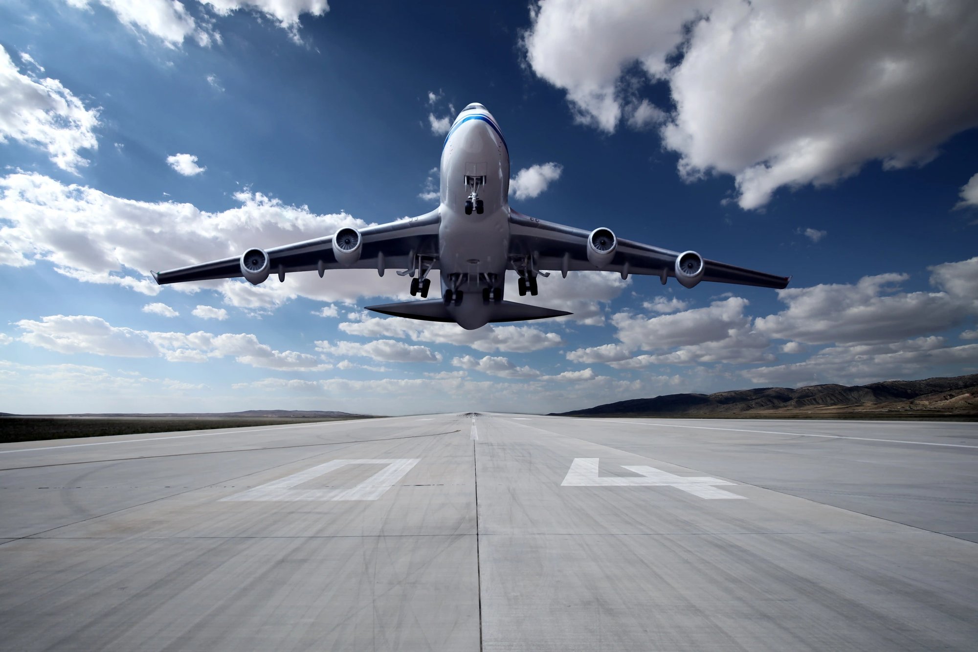 an airplane taking off from a runway