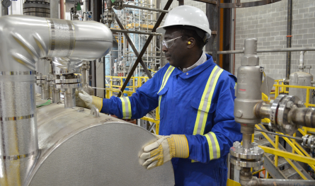 Man working in blue overalls